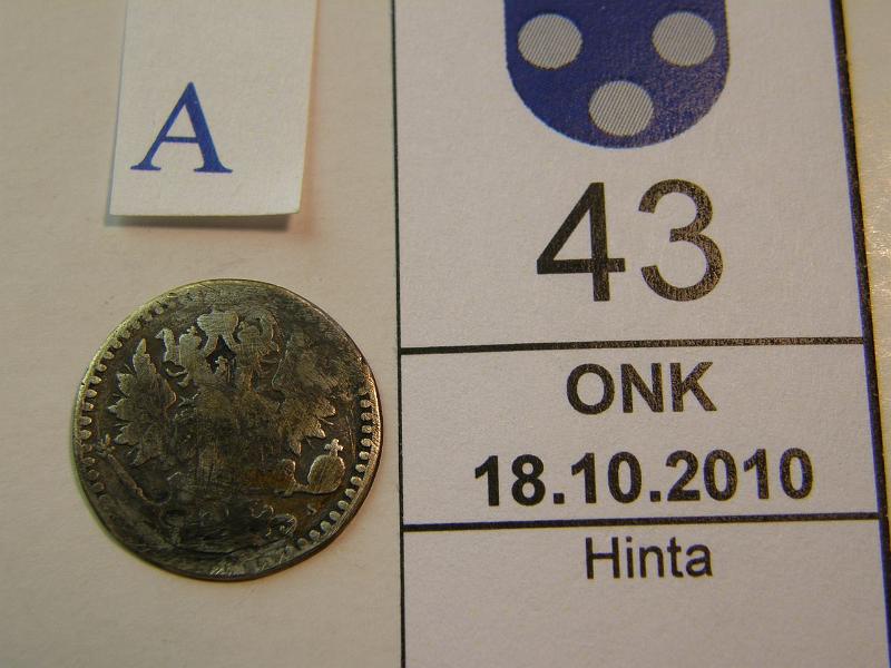 kohde_043_a.jpg - Kohde 43, tunnuspuoli, lhthinta: 42 € 25 p 1871 taipunut, litistynyt, reunavika, kunto: 2.