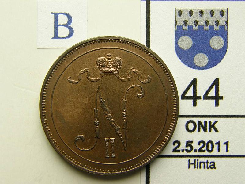 kohde_044_b.jpg - Kohde 44, tunnuspuoli, lhthinta: 650 € 10 p 1897 peilipinta, lievsti tummunut, kunto: 9.