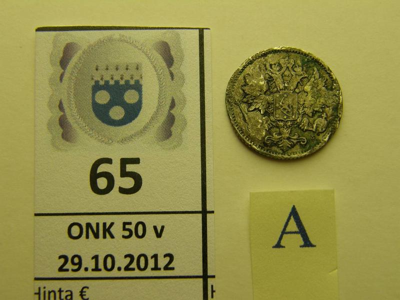 k-0065-a.jpg - Kohde 65 (kuva 1/2), lhthinta: 700 € 25 p 1876 Ag, ollut koruna, juotoksia, ylim. metallia, rvja. Harvinainen, kunto: ?
