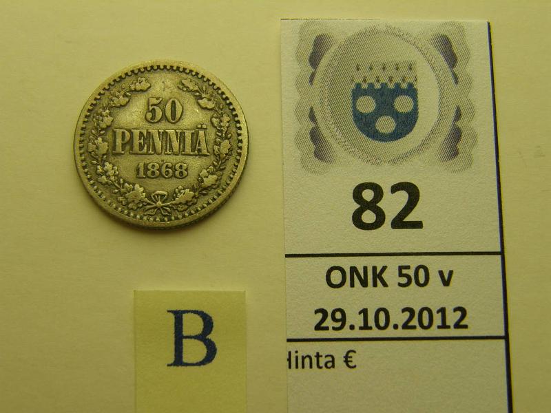 k-0082-b.jpg - Kohde 82 (kuva 2/2), lhthinta: 60 € 50 p 1868 Ag, kunto: 2/3