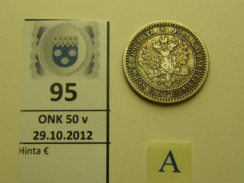k-0095-a.jpg - Kohde 95 (kuva 1/2), lhthinta: 7 € 1 mk 1865 Ag, SNY 398.1.1(?), kunto: 4/5