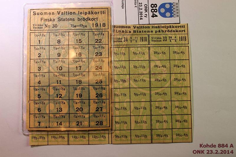 k-0884-a.jpg - Kohde 884, lhthinta: 5 € Leipkortit (2) 1918 Suomen Valtion leipkortti vko 30. Yksi reiitetty ruutu; SV lisleipkortti, kyttmtn, ylreunassa puutos, takana omistajan nimi?, kunto: 4,3