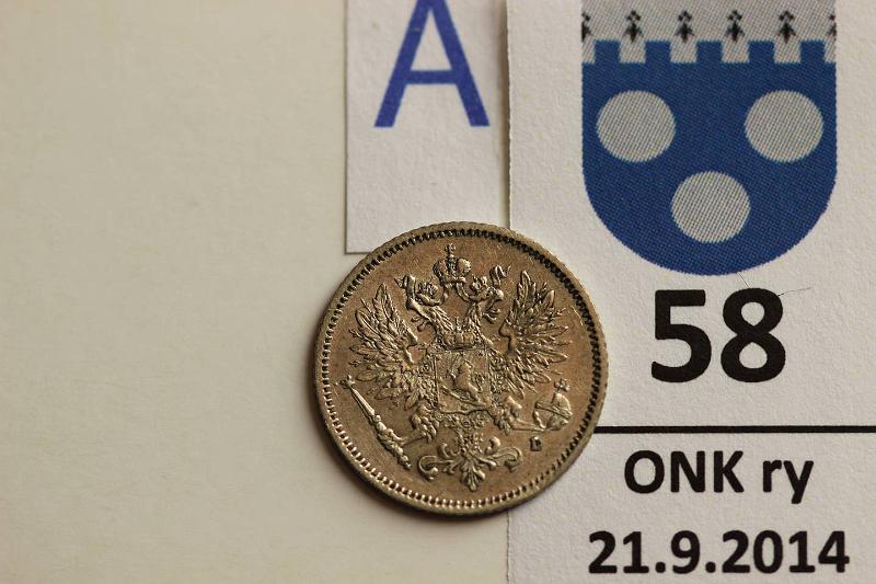 k-0058-a.jpg - Kohde 58 (kuva 1/2), lhthinta: 10 € 25 p 1908 Ag, kunto: 6