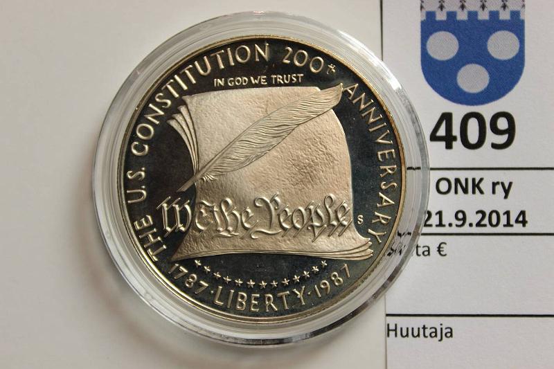 k-0409-a.jpg - Kohde 409, lhthinta: 20 € USA 1 USD 1987s KM#220 Ag, 26,73g/900, Constitution 200y, kapseli, kunto: 10