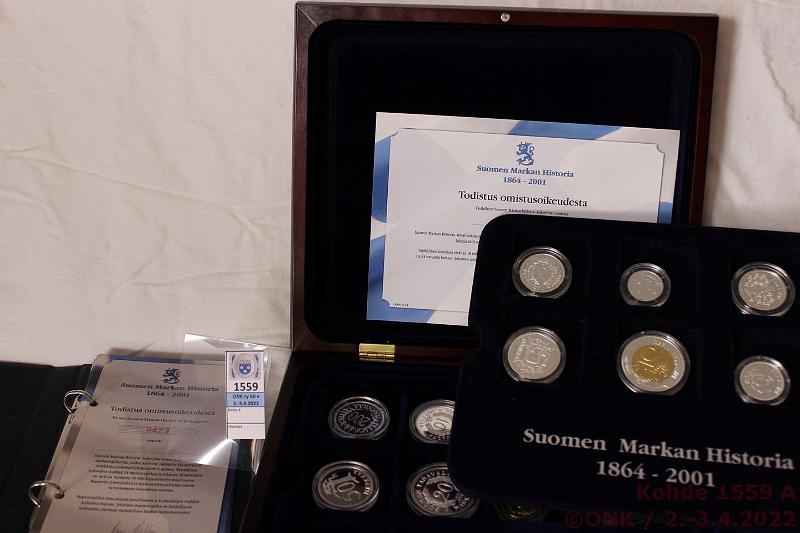 k-1559-a.jpg - Kohde 1559, lhthinta: 110 € / myyntihinta: 110 € Suomen markan historia -sarja (18) Ag, Proof, 275g puhdasta hopeaa. Monetan markkareplikoita kapseleissa, puulaatikko ja todistukset kansiossa, kunto: 10