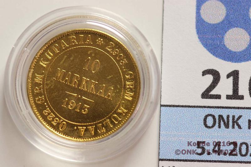 k-0216-b.jpg - Kohde 216 (kuva 2/2), lhthinta: 250 € / myyntihinta: 370 € 10 mk 1913 Au. Kapselissa, kunto: 9