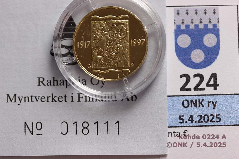 k-0224-a.jpg - Kohde 224 (kuva 1/2), lhthinta: 500 € / myyntihinta: 652 € 1000 mk 1997 Au, 8,64g/900. Proof, Itsenisyys 80v, kotelo, tod, kunto: 10