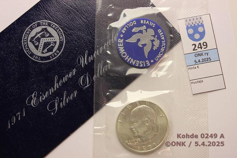 k-0249-a.jpg - Kohde 249 (kuva 1/2), lhthinta: 5 € / myyntihinta: 11 € USA 1 $ 1971 KM#203a Ag, 24,59g/400. Eisenhower Silver Dollar, kuoressa, mukana jetoni, kunto: 9