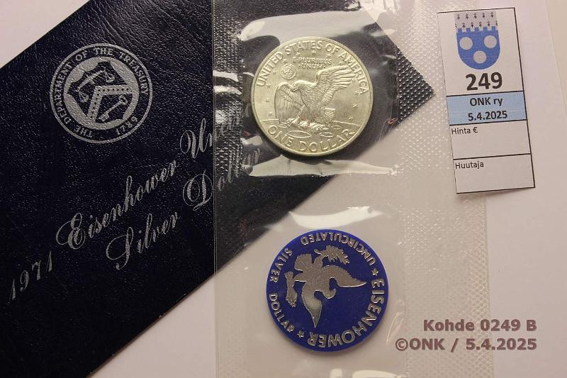 k-0249-b.jpg - Kohde 249 (kuva 2/2), lhthinta: 5 € / myyntihinta: 11 € USA 1 $ 1971 KM#203a Ag, 24,59g/400. Eisenhower Silver Dollar, kuoressa, mukana jetoni, kunto: 9