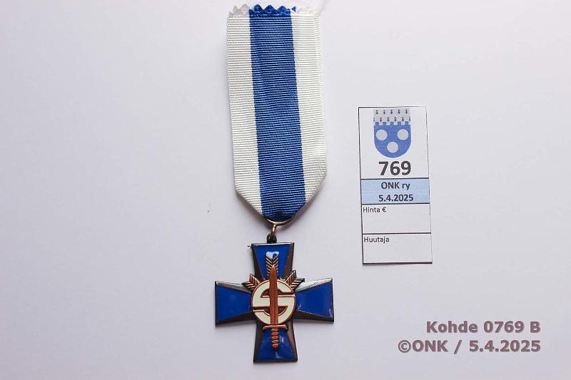 k-0769-b.jpg - Kohde 769 (kuva 2/2), lhthinta: 10 € / myyntihinta: 11 € Sininen risti Myntkirja, kunto: 9