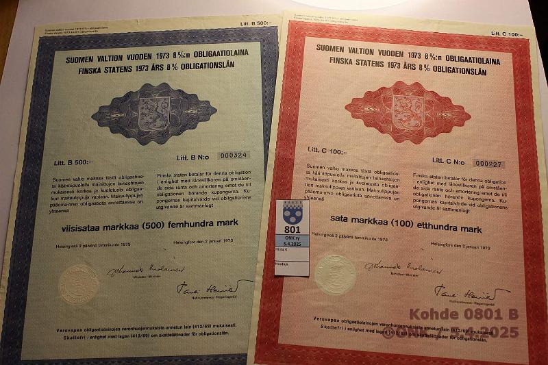 k-0801-b.jpg - Kohde 801 (kuva 2/2), lhthinta: 5 € / myyntihinta: 11 € Osakekirjoja ja oblikaatioita (6) 1970 → Suomen Vientiluotto Oy(4); Suomen Valtion oblikaatiolaina 1973 Litt B 500 mk ja Litt C 100 mk, kunto: 8-9