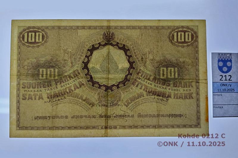 k-0212-c.jpg - Kohde 212 (kuva 3/3), lhthinta: 3000 € / myyntihinta: 3000 € 100 mk 1909 SNY 176.1.2 1506380 COL-His, vesileimanosia reunassa, ptahra, 2mm rep, kunto: 5