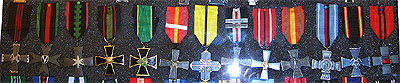 Muistoristit 25-37